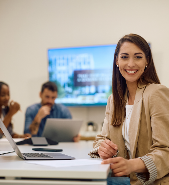 young-happy-businesswoman-working-on-laptop-at-cre-2026-03-17-07-06-31-utc 1